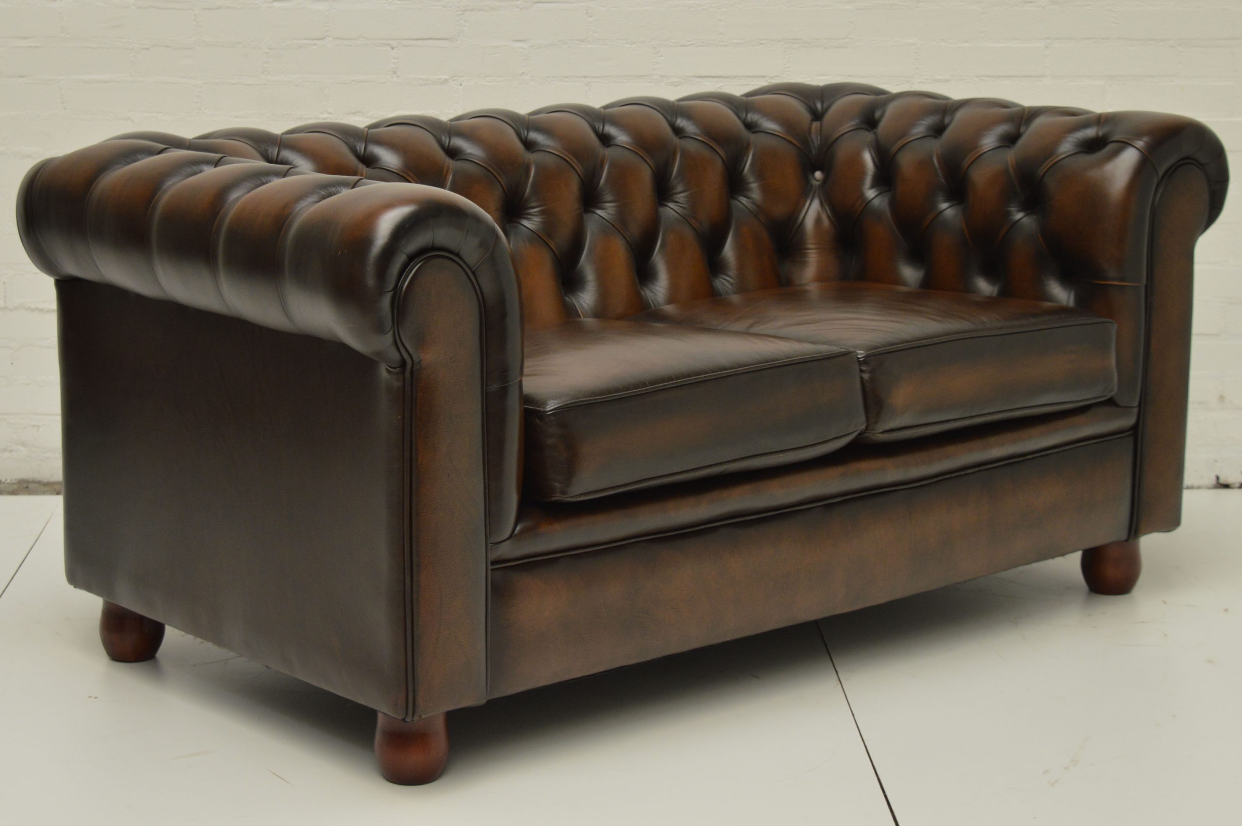 2 zits Chesterfield in ant. Brown