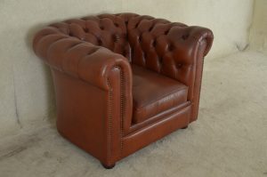 Low back chesterfield chair occasion in cognac