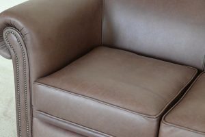 Gladde chesterfield in luxe leder bijna nieuw