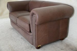 Gladde chesterfield in luxe leder bijna nieuw