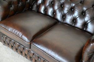 2 zits full size chesterfield in ant. Brown