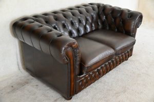 2 zits full size chesterfield in ant. Brown