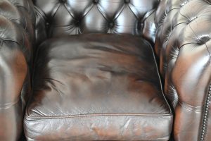 2 Low Back Chesterfields in ant. Brown